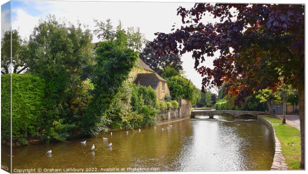 Bourton on the Water Canvas Print by Graham Lathbury