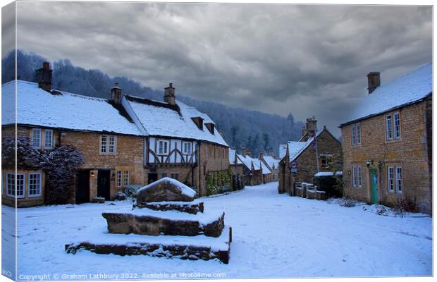 Castle Combe, Cotswolds, in the snow Canvas Print by Graham Lathbury