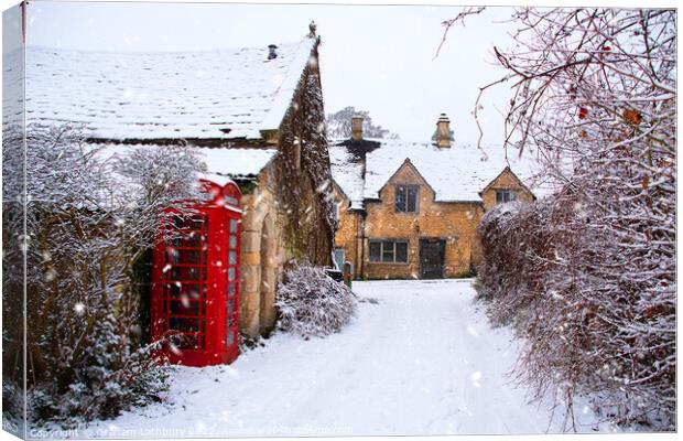 Castle Combe in winter Canvas Print by Graham Lathbury