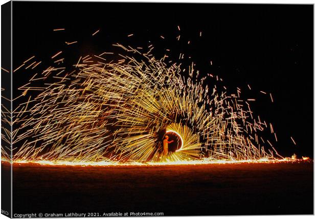 Fire Spinners, Thailand Canvas Print by Graham Lathbury