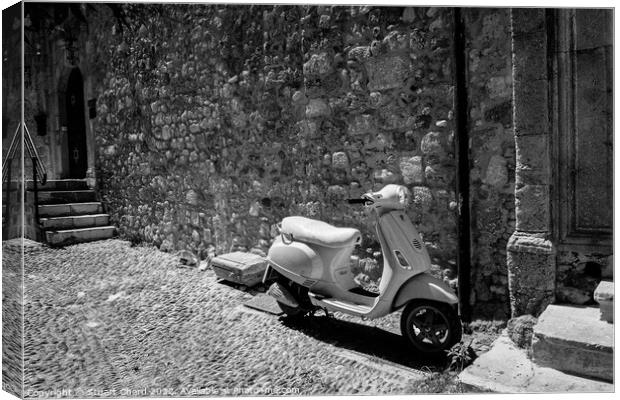 Scooter in Rhodes Old Town Canvas Print by Stuart Chard