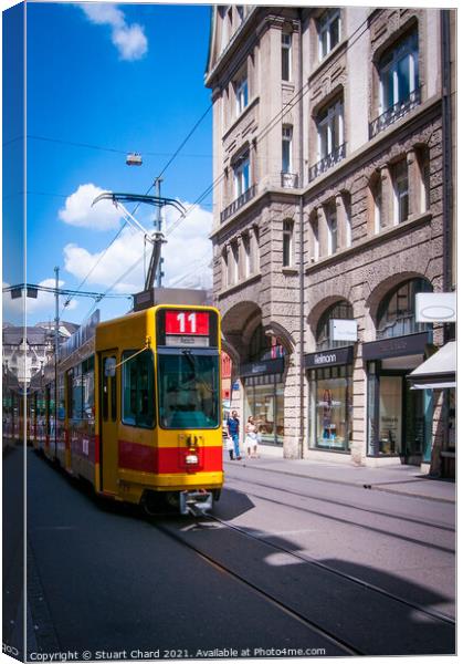 City Tram in Basel Switzerland Canvas Print by Stuart Chard