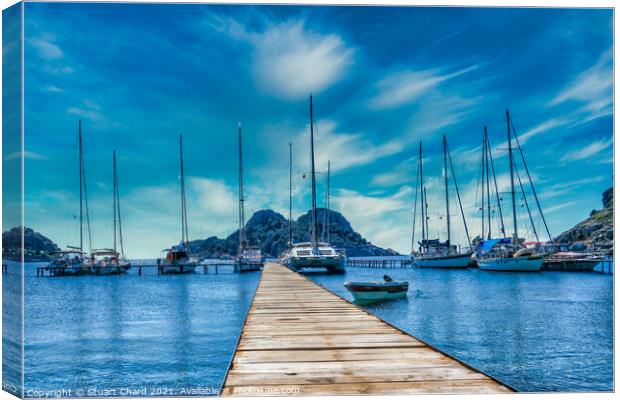 Bay with boats on a jetty artwork Canvas Print by Stuart Chard