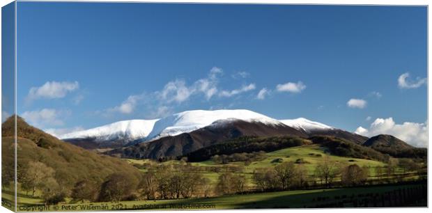 Snow capped Skiddaw viewed from Wythop Valley Canvas Print by Peter Wiseman