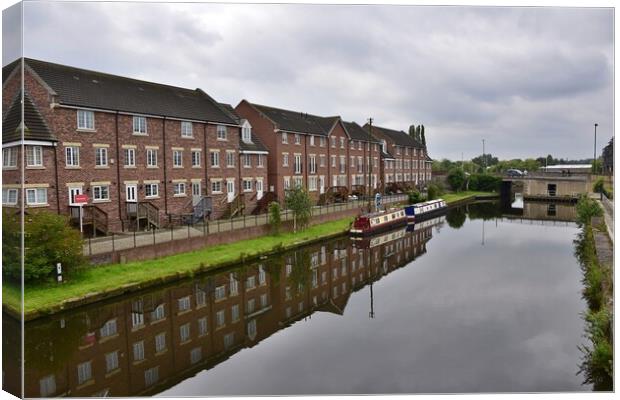 Building reflections in Wakefield canal Canvas Print by Roy Hinchliffe