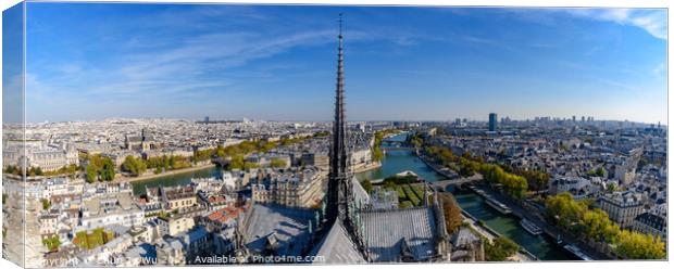 Panoramic view of the center tower from the top of Notre Dame Cathedral in Paris, France Canvas Print by Chun Ju Wu