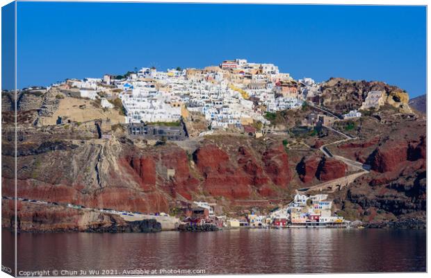 View of the white buildings of Oia village from Aegean Sea, Santorini, Greece Canvas Print by Chun Ju Wu