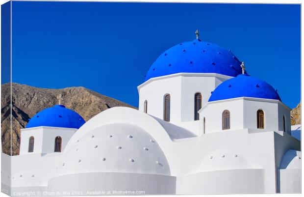 Blue domed church in Santorini, Greece Canvas Print by Chun Ju Wu