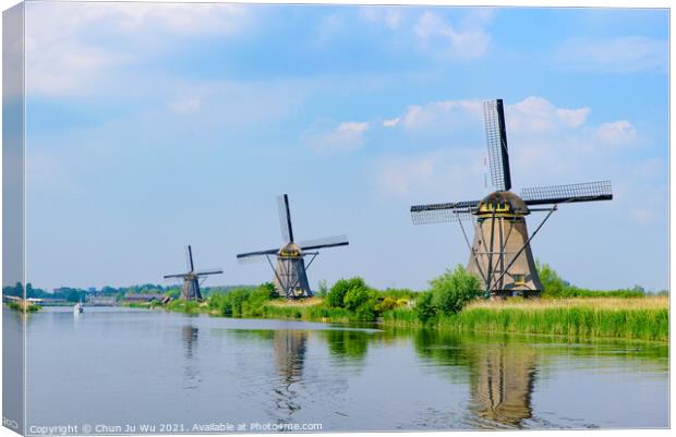 The windmills and the reflection on water in Kinderdijk, a UNESCO World Heritage site in Rotterdam, Netherlands Canvas Print by Chun Ju Wu