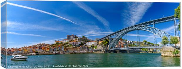 Panorama of the riverbank of Ribeira District and Dom Luis I Bridge in Porto, Portugal Canvas Print by Chun Ju Wu