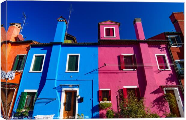 Burano island, famous for its colorful fishermen's houses, in Venice, Italy Canvas Print by Chun Ju Wu
