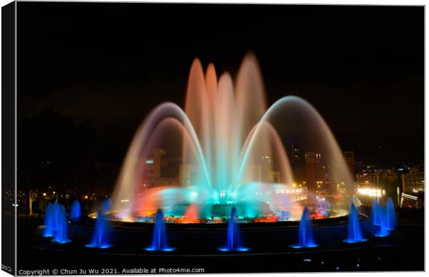 The colorful water show of Magic Fountain of Montjuic with light and music in Barcelona , Spain Canvas Print by Chun Ju Wu