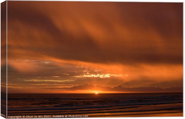 Muriwai Beach at sunset time with colorful clouds, New Zealand Canvas Print by Chun Ju Wu