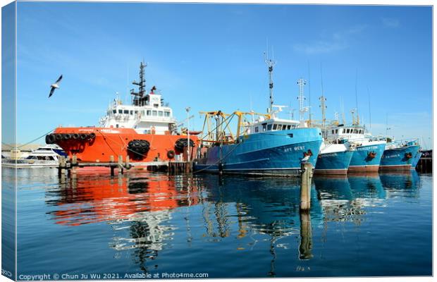 Fishing boats at harbour with the reflection on water in Fremantle, WA, Australia Canvas Print by Chun Ju Wu