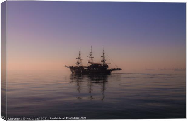 Ship on calm sea in Thessaloniki, Greece. Canvas Print by Nic Croad