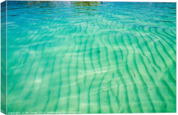 Sand ripple patters in a clear sea Canvas Print by Nic Croad