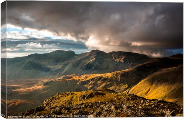 Scafells sunset from the Crinkle Crags ridge. Canvas Print by John Henderson