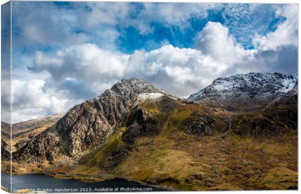 Tryfan  snow showers. Canvas Print by John Henderson