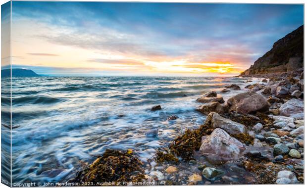 LLandudno West shore sunset Canvas Print by John Henderson