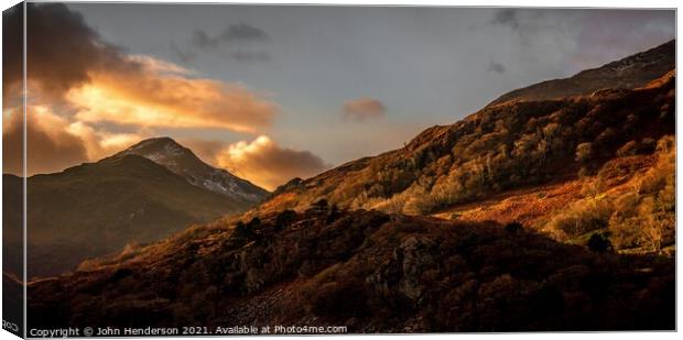 Majestic Sunset at Y Aran Canvas Print by John Henderson