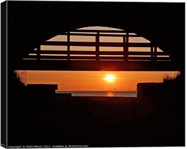 Water tunnel and wooden footbridge  sunset Canvas Print by Mark Ritson
