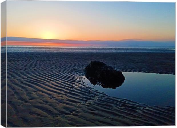 sunset with rockpool on the beach  Canvas Print by Mark Ritson