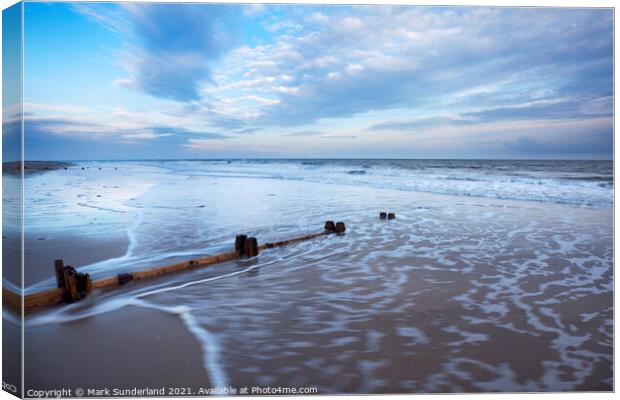 Groynes and Receding Tide on Alnmouth Beach at Dusk Canvas Print by Mark Sunderland