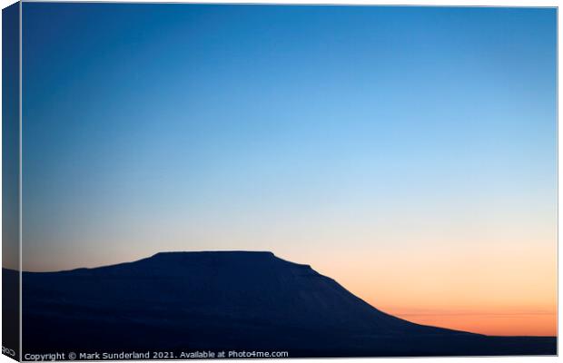 The Flat Topped Peak of Ingleborough at Sunset in Winter Canvas Print by Mark Sunderland