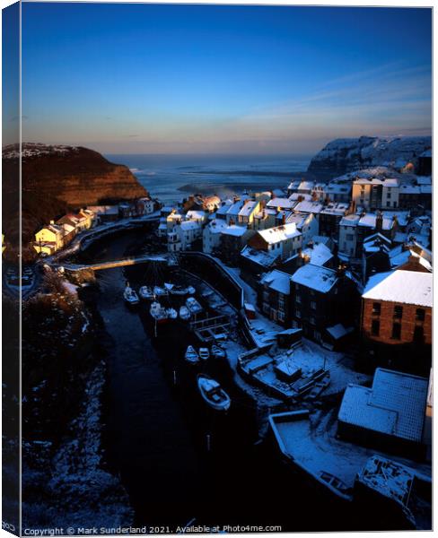 Snow Covered Rooftops at Staithes Canvas Print by Mark Sunderland