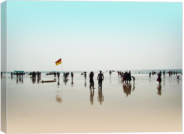 Tourists on a Sea Beach Canvas Print by Susmita Mishra