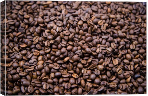 top view of fresh roasted coffee beans background. Background of roasted coffee beans	 Canvas Print by Emils Vanags