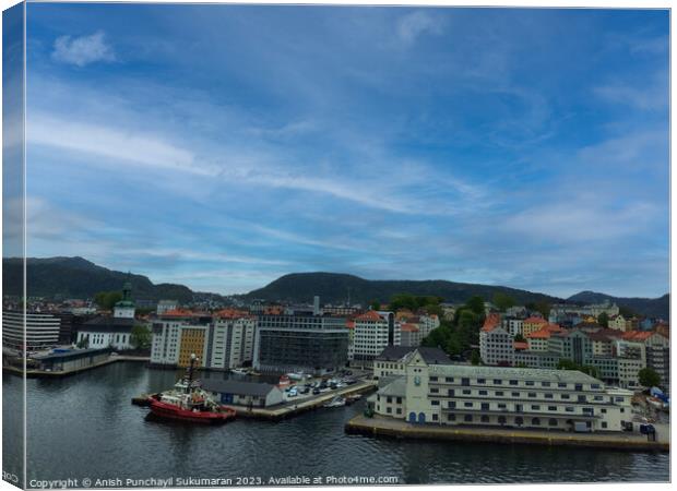 Bergen Norway 22 may 2023 Bergen Cityscape with Beautiful Harbor and Majestic Mountains Canvas Print by Anish Punchayil Sukumaran