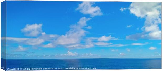 clam and blue ocean and beautiful sky Canvas Print by Anish Punchayil Sukumaran