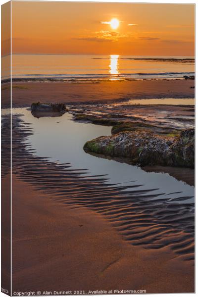 Sunrise and shadows on Embleton Beach, Northumbria Canvas Print by Alan Dunnett