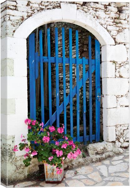 Old Blue Greek Door with flowers, Corfu, Greece Canvas Print by Neil Overy
