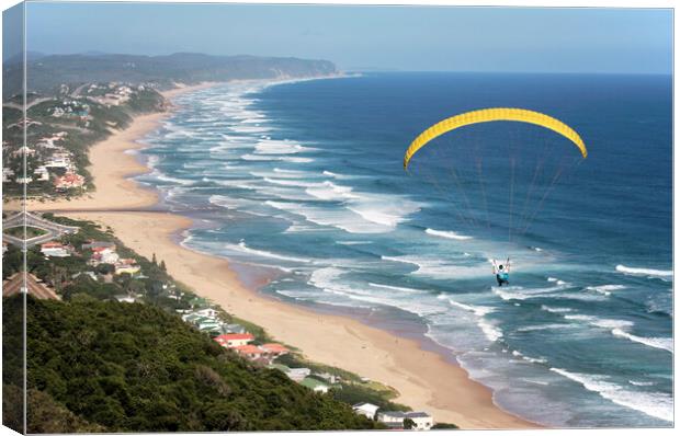 Parasailing over Wilderness Beach, South Africa Canvas Print by Neil Overy