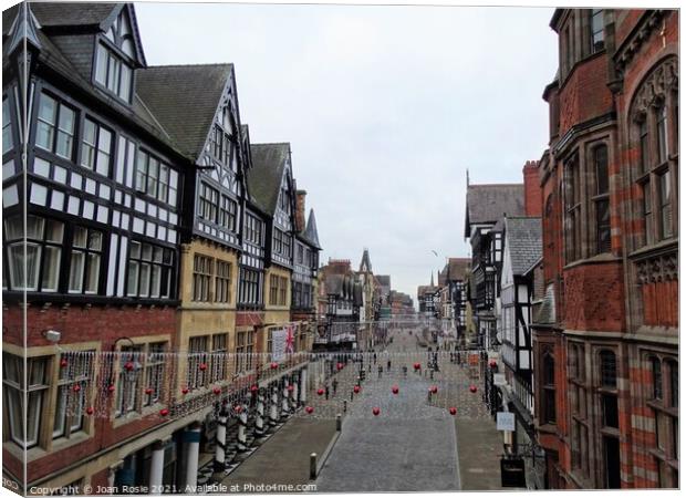 Almost deserted street in Chester on Christmas Day Canvas Print by Joan Rosie