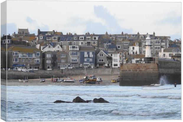 Close-up view of buildings and lighthouse in St Ives, Cornwall Canvas Print by Joan Rosie