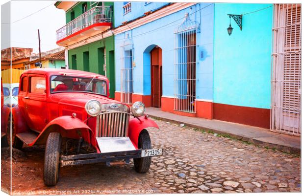 Trinidad, Cuba. Old vintage car in a street Canvas Print by Delphimages Art