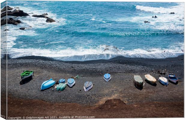 Black sand beach in Lanzarote, Canary Islands Canvas Print by Delphimages Art