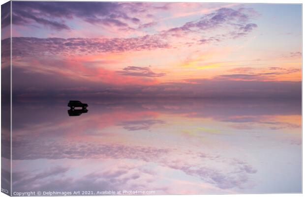 Mirror effect at sunset in Salar de Uyuni, Bolivia Canvas Print by Delphimages Art