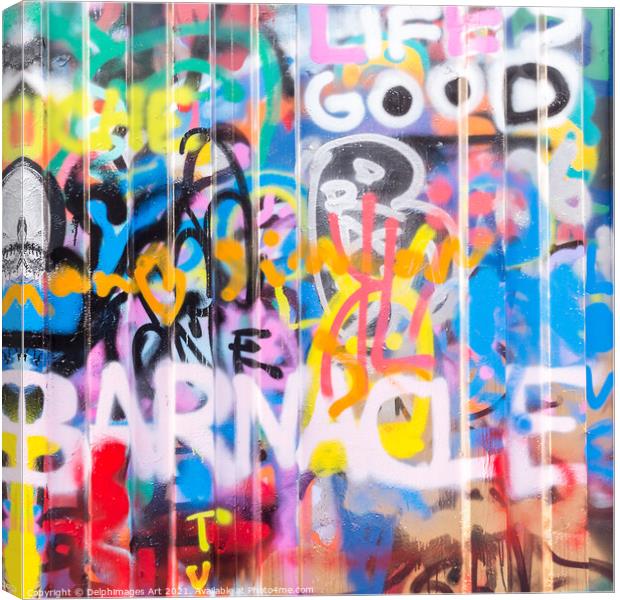 Colourful graffitis on a wall, urban abstract Canvas Print by Delphimages Art