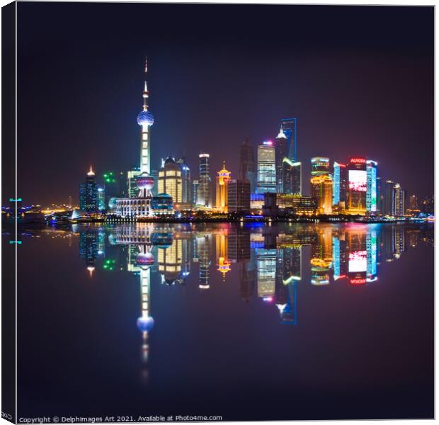 Shanghai skyline at night reflections in the river Canvas Print by Delphimages Art