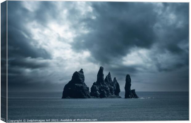 Iceland. Rocks in the ocean near Vik Canvas Print by Delphimages Art