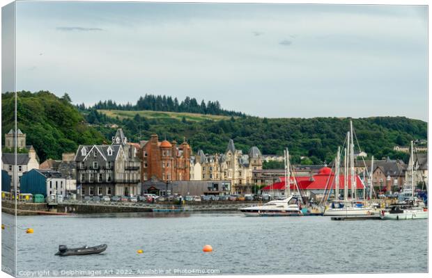 Oban town and harbor in Argyll, Scotland Canvas Print by Delphimages Art