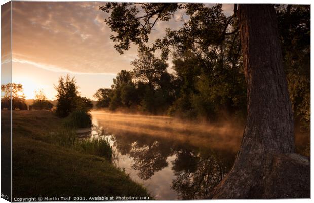 River Stour - sun through the mist on the river Canvas Print by Martin Tosh