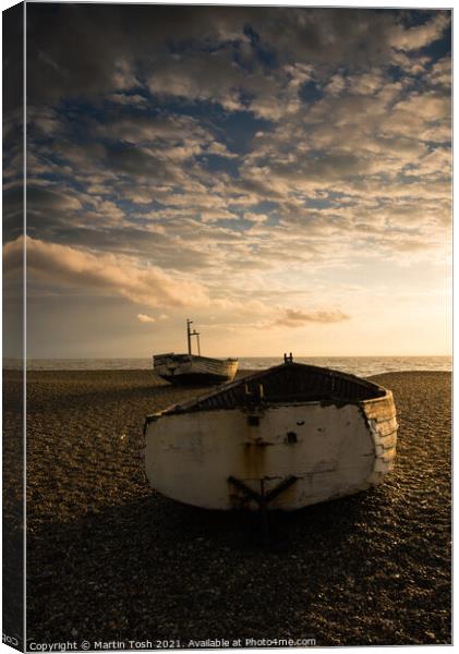 Ready ii. Old rowing boats on shingle beach Canvas Print by Martin Tosh