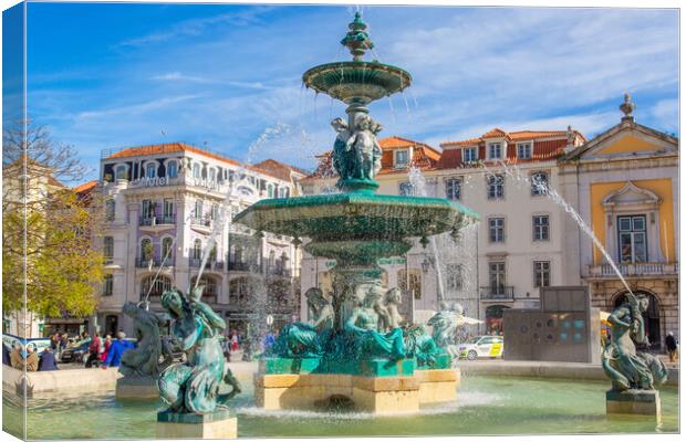 Famous Rossio Square in Lisbon Canvas Print by Elijah Lovkoff