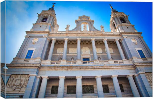 Madrid, Famous Almudena Cathedral on a bright sunny day Canvas Print by Elijah Lovkoff