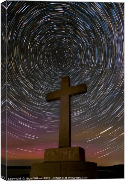 Aurora, light pollution & star trails - Anglesey Canvas Print by Nigel Wilkins